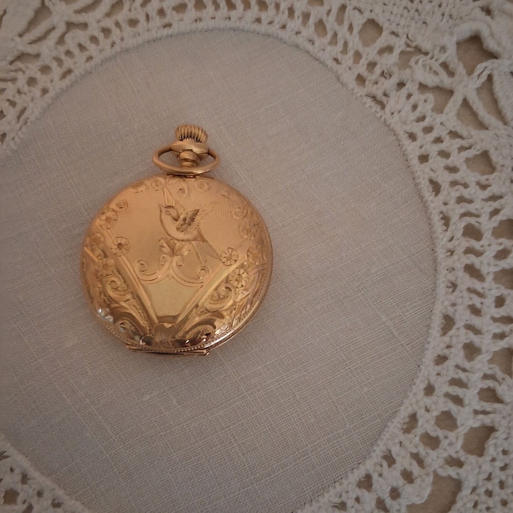 Elegant Gold Pocket Watch with Bird Design